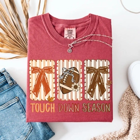 On-the-Go Fashion Online Exclusive | Block Touch Down Season Bows Graphic on Short Sleeve Comfort Color Tee in Crimson Red