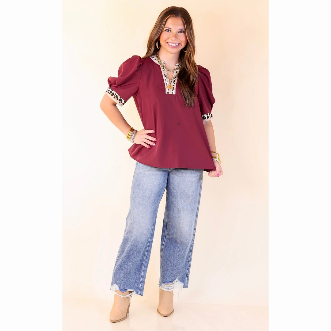 Standout Style V Neck Top with Short Balloon Sleeves and Leopard Print Trim in Maroon Versatile Wear