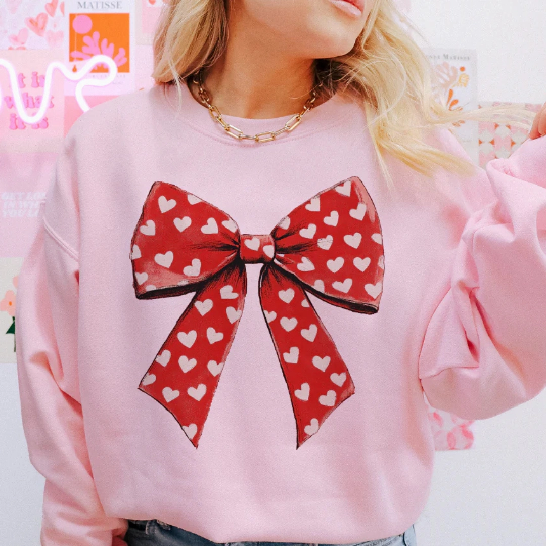 Trendy Top Comfy and Versatile Online Exclusive | Valentine Big Red Bow with Hearts Graphic Sweatshirt in Pink