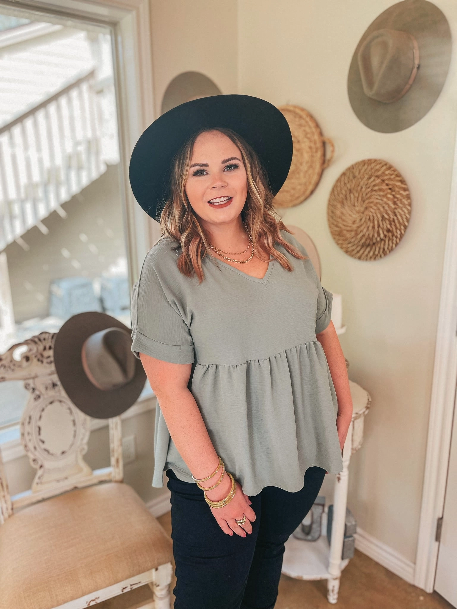 DurableThreadwork MoistureManagementSystem Touring the City Short Sleeve V Neck Babydoll Top in Sage Green