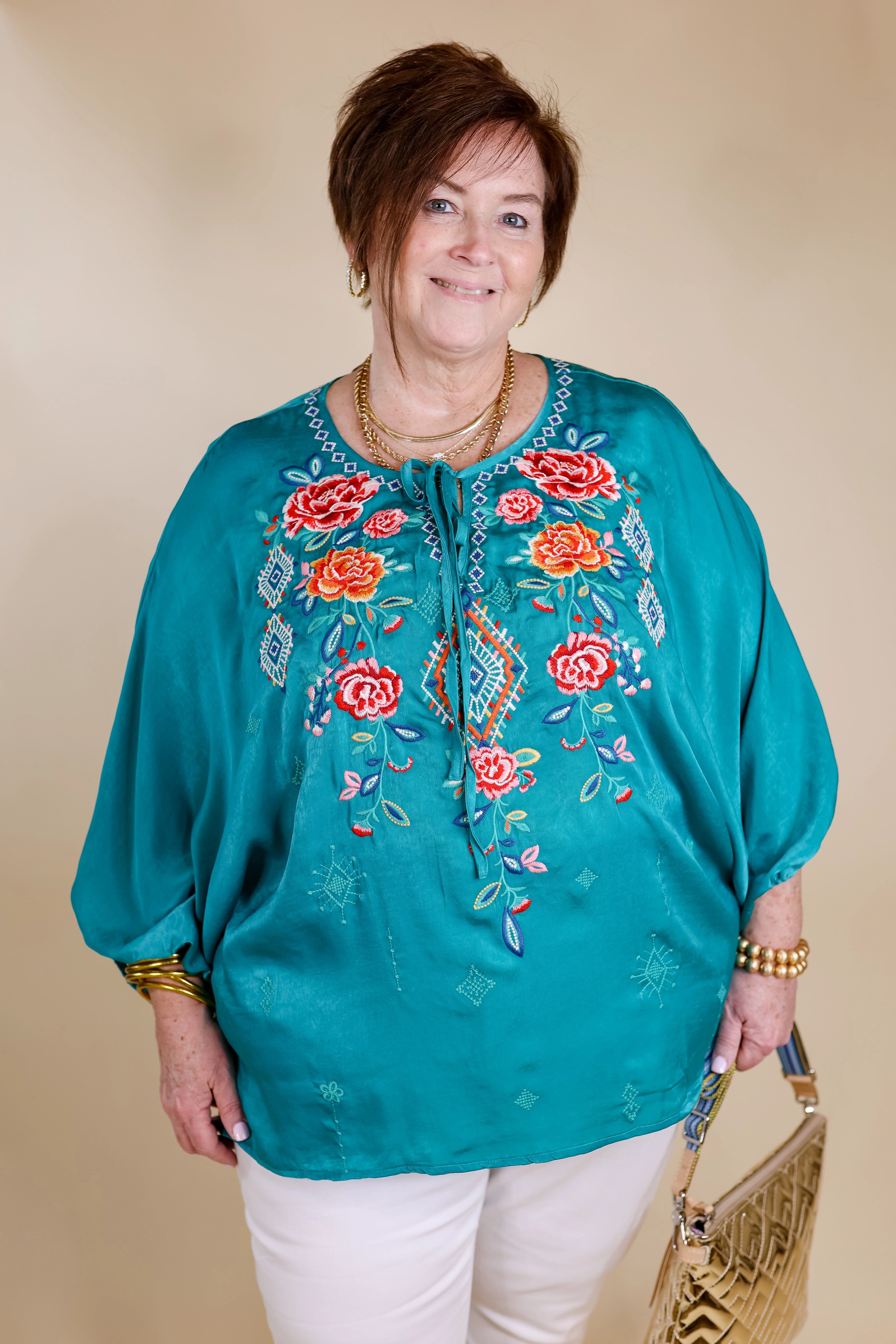 Never Out Done Floral Embroidered Poncho Top with Front Keyhole in Teal Non Slip Shoulder Seams AntiSnagYarnProcessing