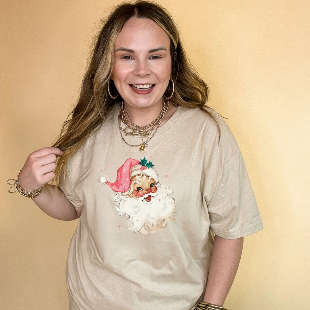 Online Exclusive | Santa Face with Pink Santa Hat Graphic Tee in Multiple Color Options Pocket Design
