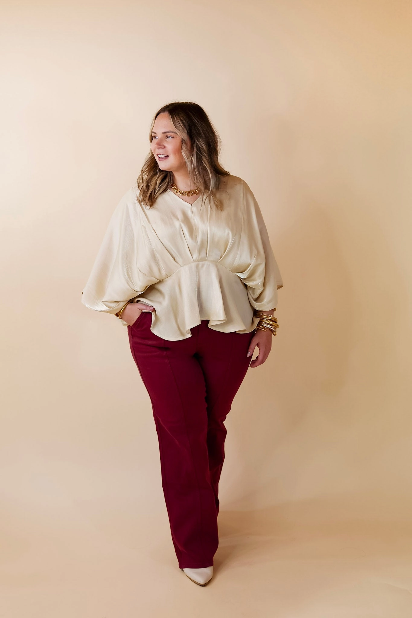 Camera Glow Last Chance Size Small | Hear the Music Drop Sleeve Satin V Neck Peplum Top in Champagne