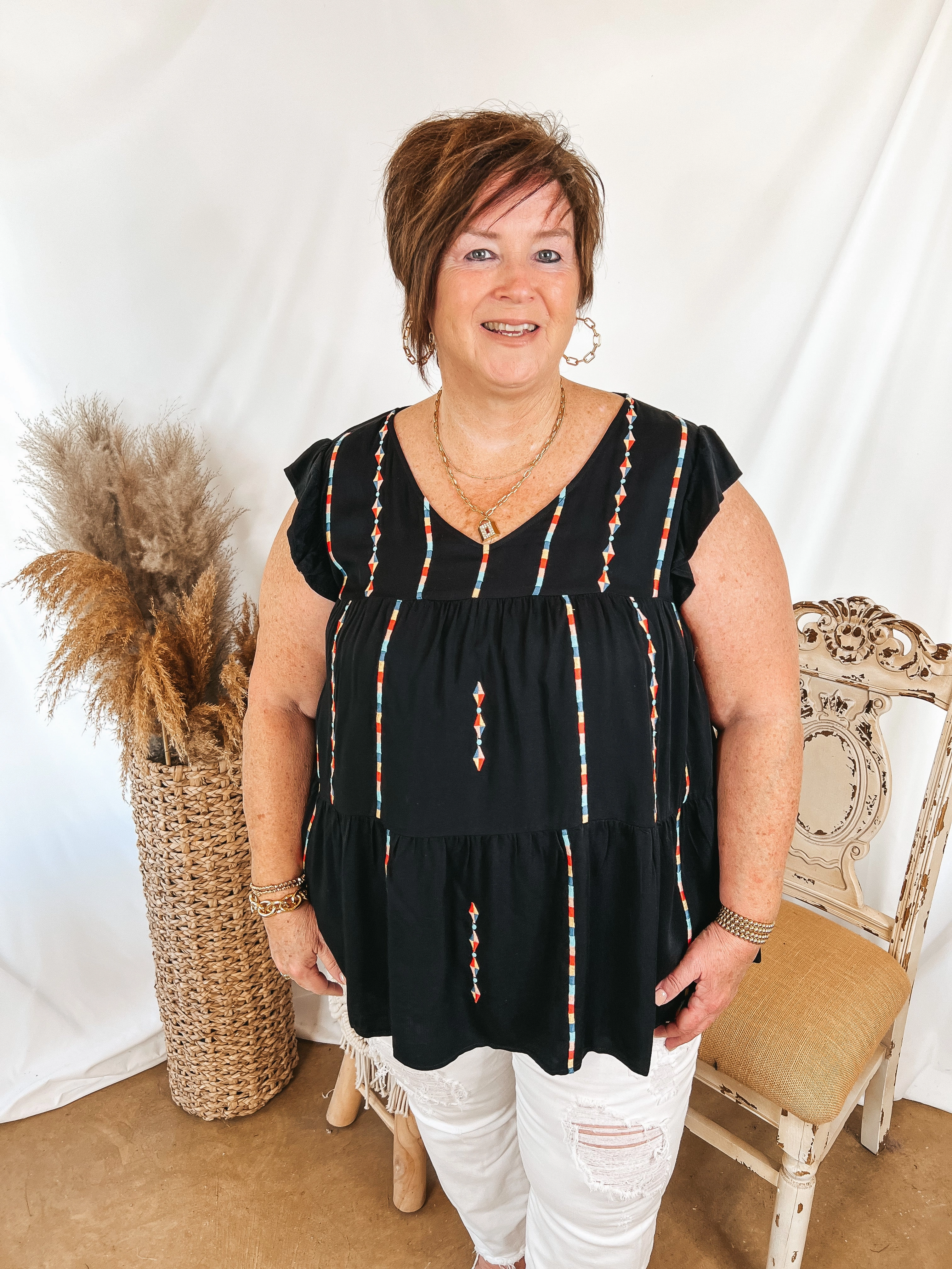 ElasticEdgeBinding Last Chance Size Small & Medium | Rum Punch Embroidered Tiered Top with Ruffle Cap Sleeves in Black