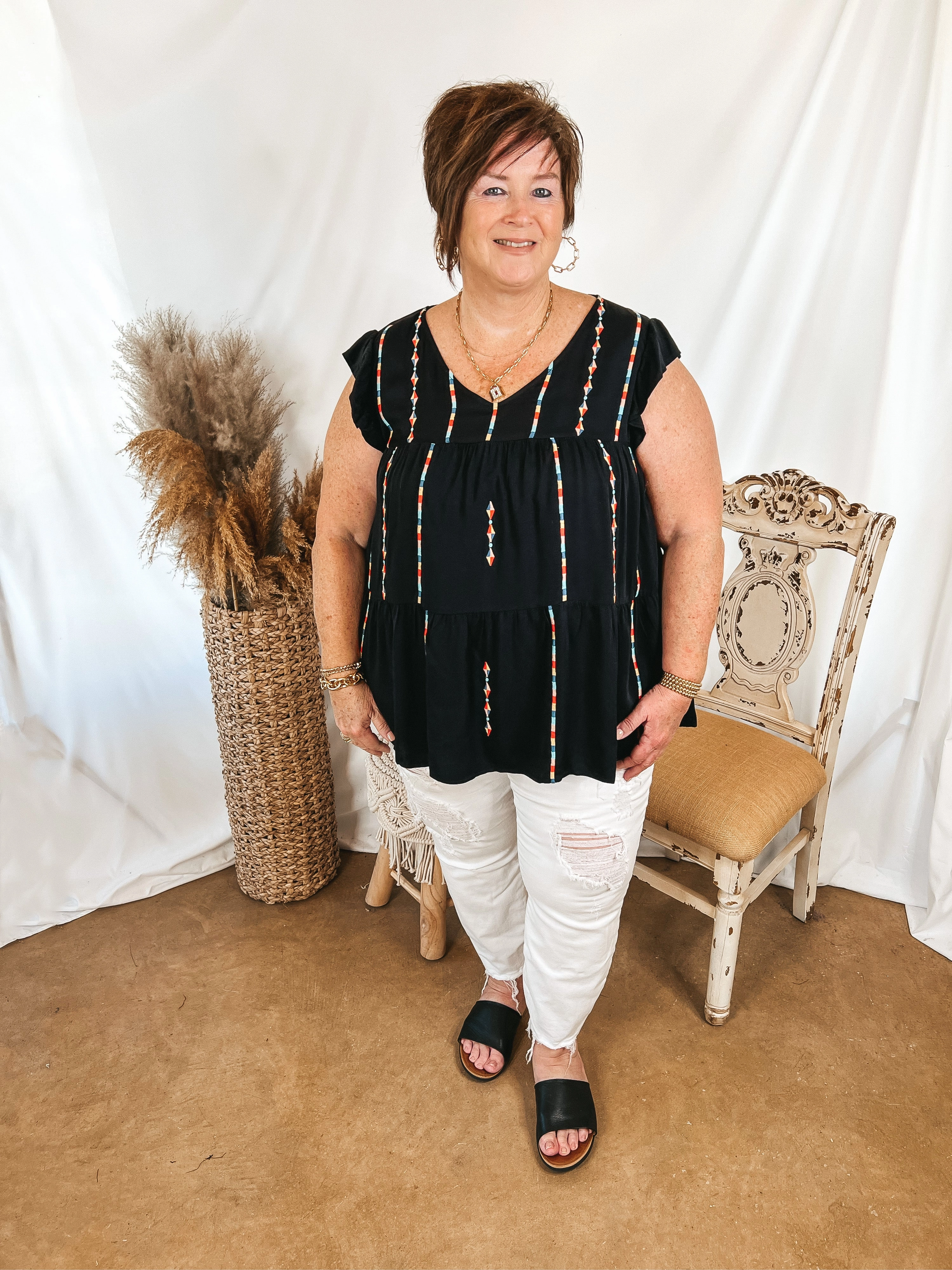 Last Chance Size Small & Medium | Rum Punch Embroidered Tiered Top with Ruffle Cap Sleeves in Black Flattering Drape Moisture Management