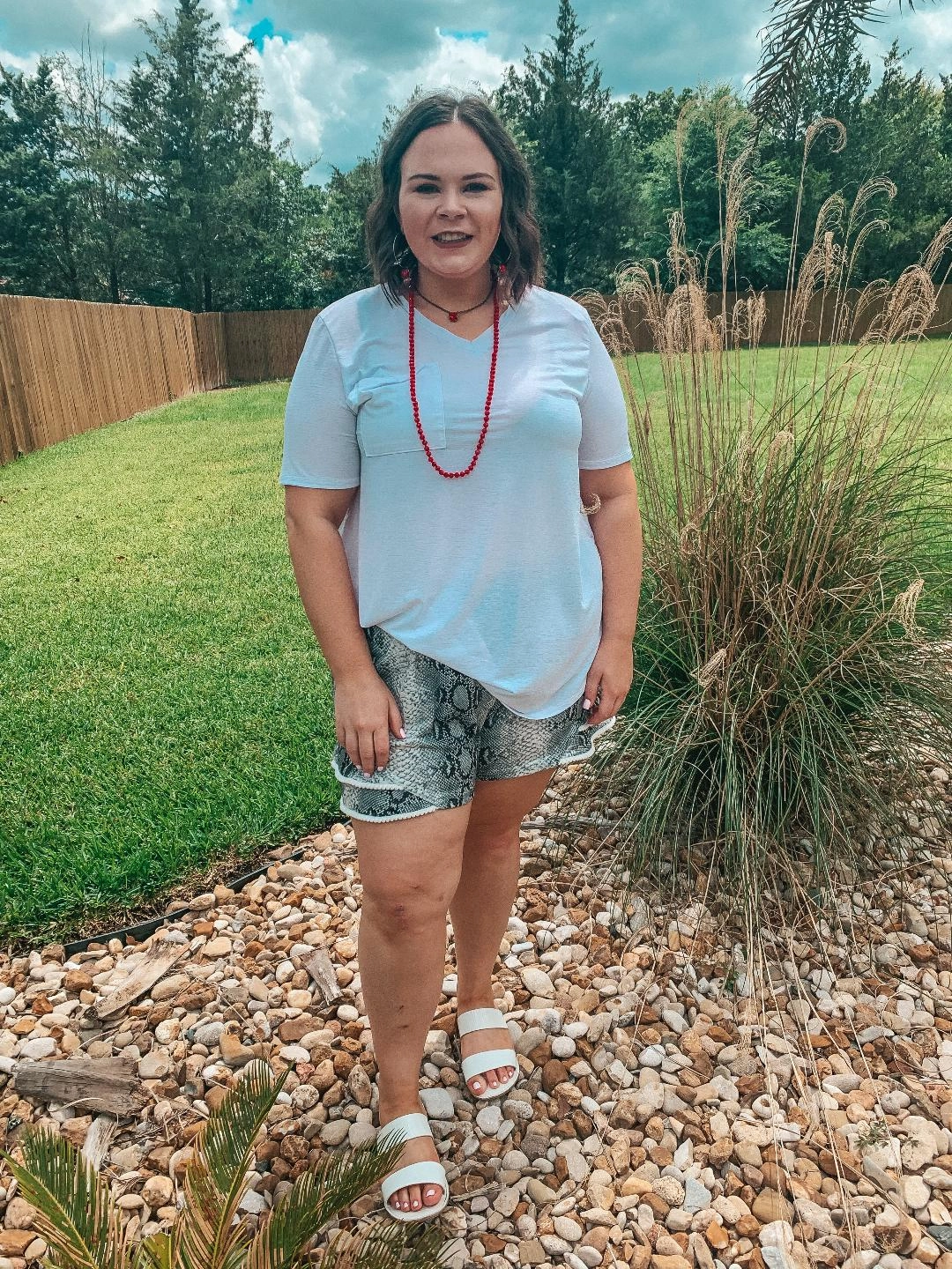 All Purpose Last Chance Size Small, Large & XL | Making Hissstory Ruffle Hem Shorts with Pom Pom Trim in Snakeskin