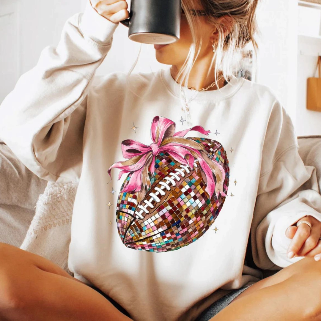 Online Exclusive | Coquette Disco Football Graphic Sweatshirt in Cream Athletic Wear