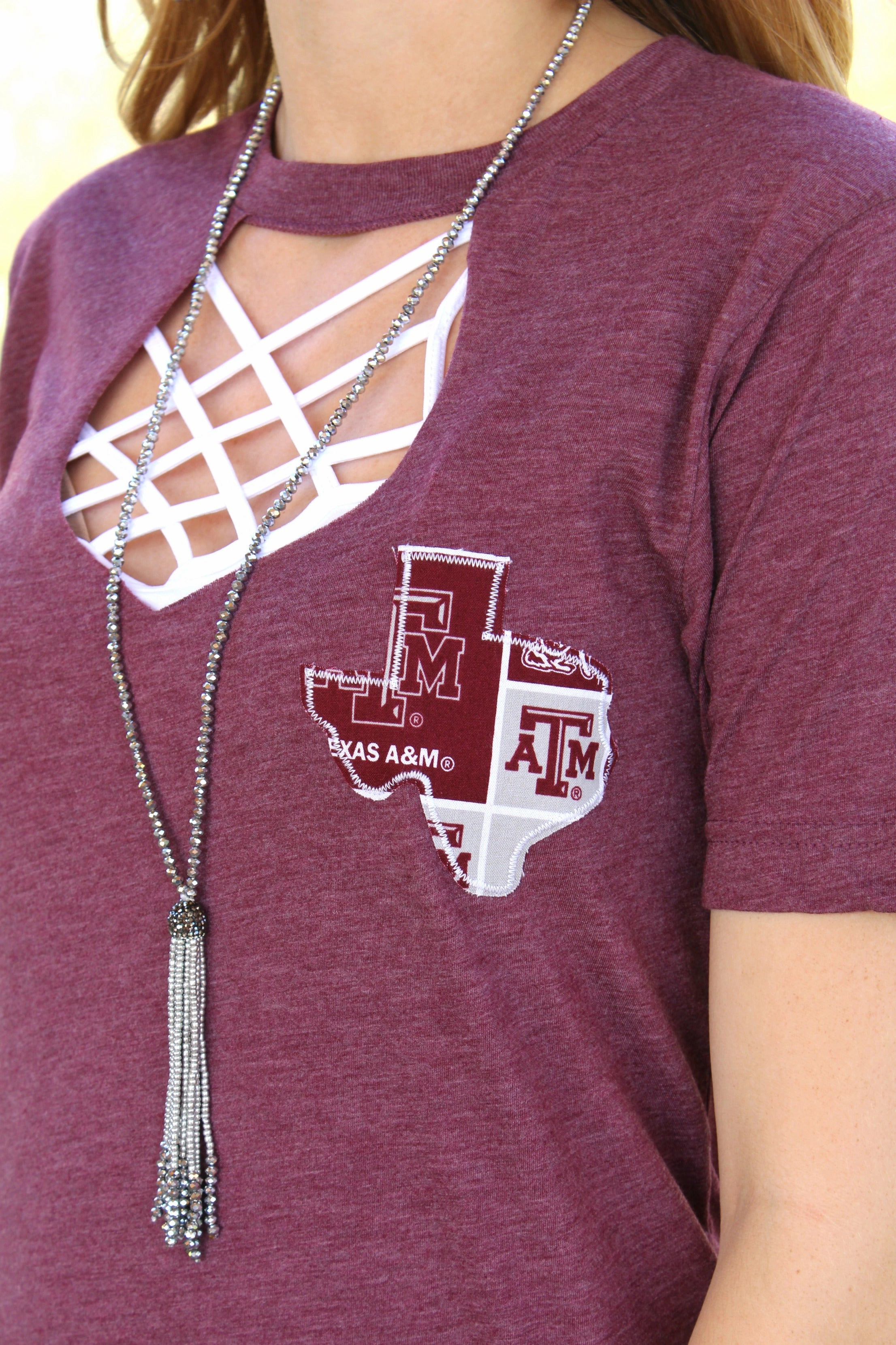AllWeatherComfort Go Texas A&M Aggies Short Sleeve Tee with Keyhole Cut Out in Heather Maroon