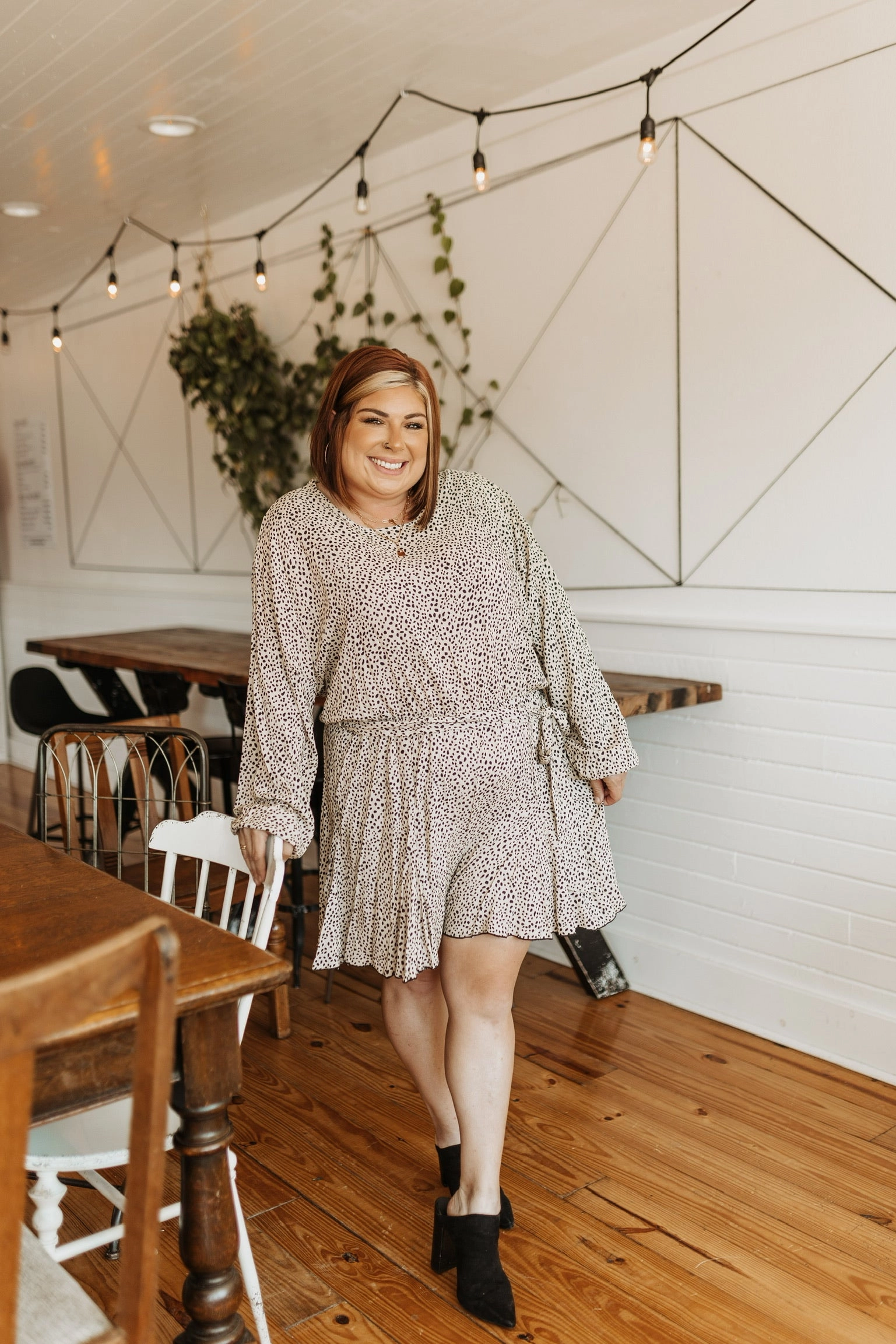 Spring Glow Swift Moves Dotted Long Sleeve Romper with Waist Tie in Beige