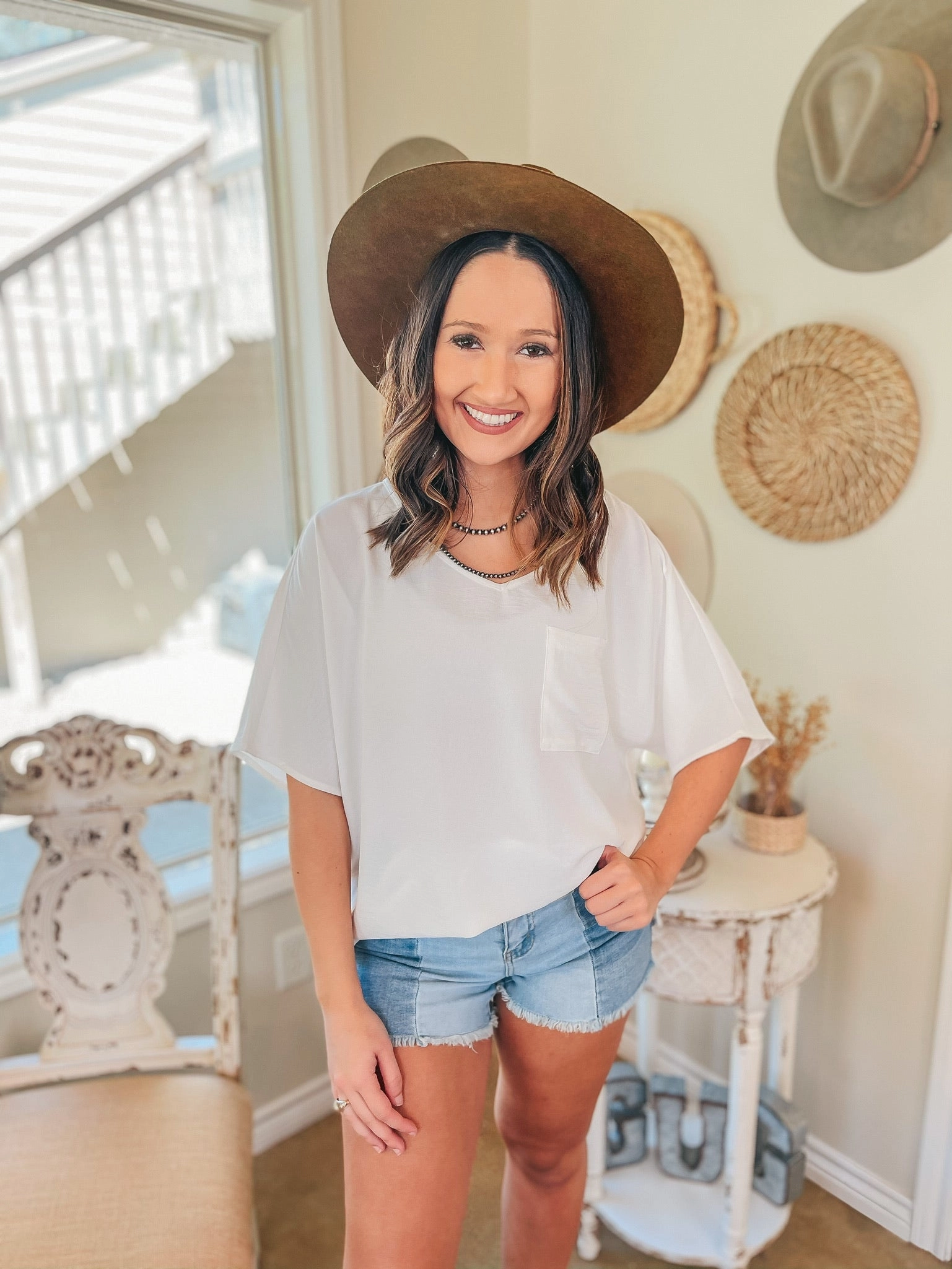 On Record V Neck Short Sleeve Shift Top with Front Pocket in Ivory UVProtection Metro Mode