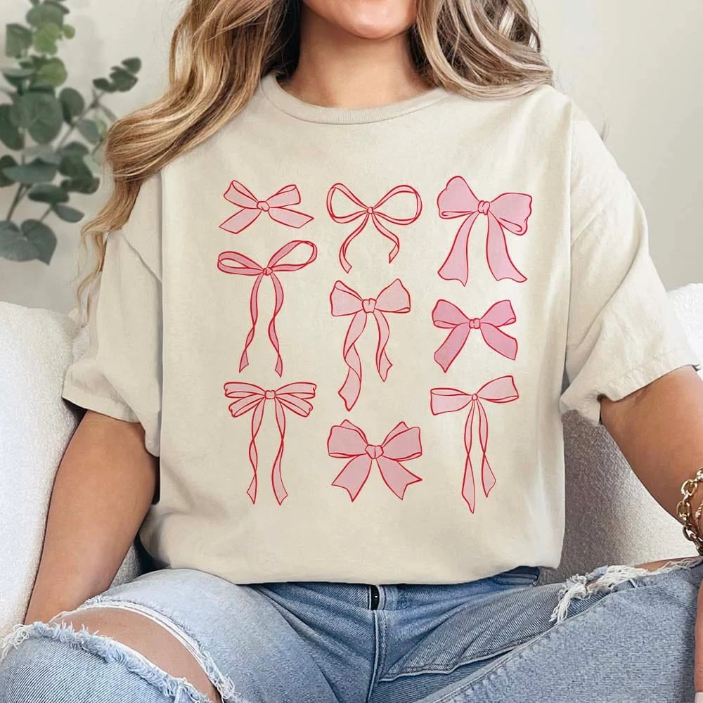 Popular Seasonal Outfit Online Exclusive | Coquette Bow Short Sleeve Graphic Tee in Cream