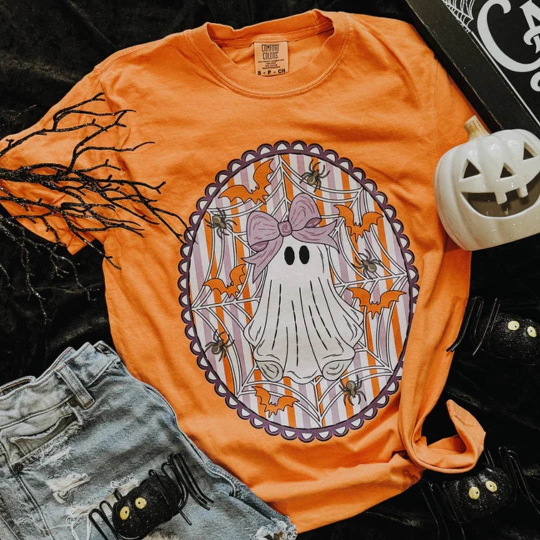 Non Restrictive Silhouette Roomy Waist Online Exclusive | Girly Ghost Web Soft Graphic on Short Sleeve Comfort Color Tee in Melon Orange