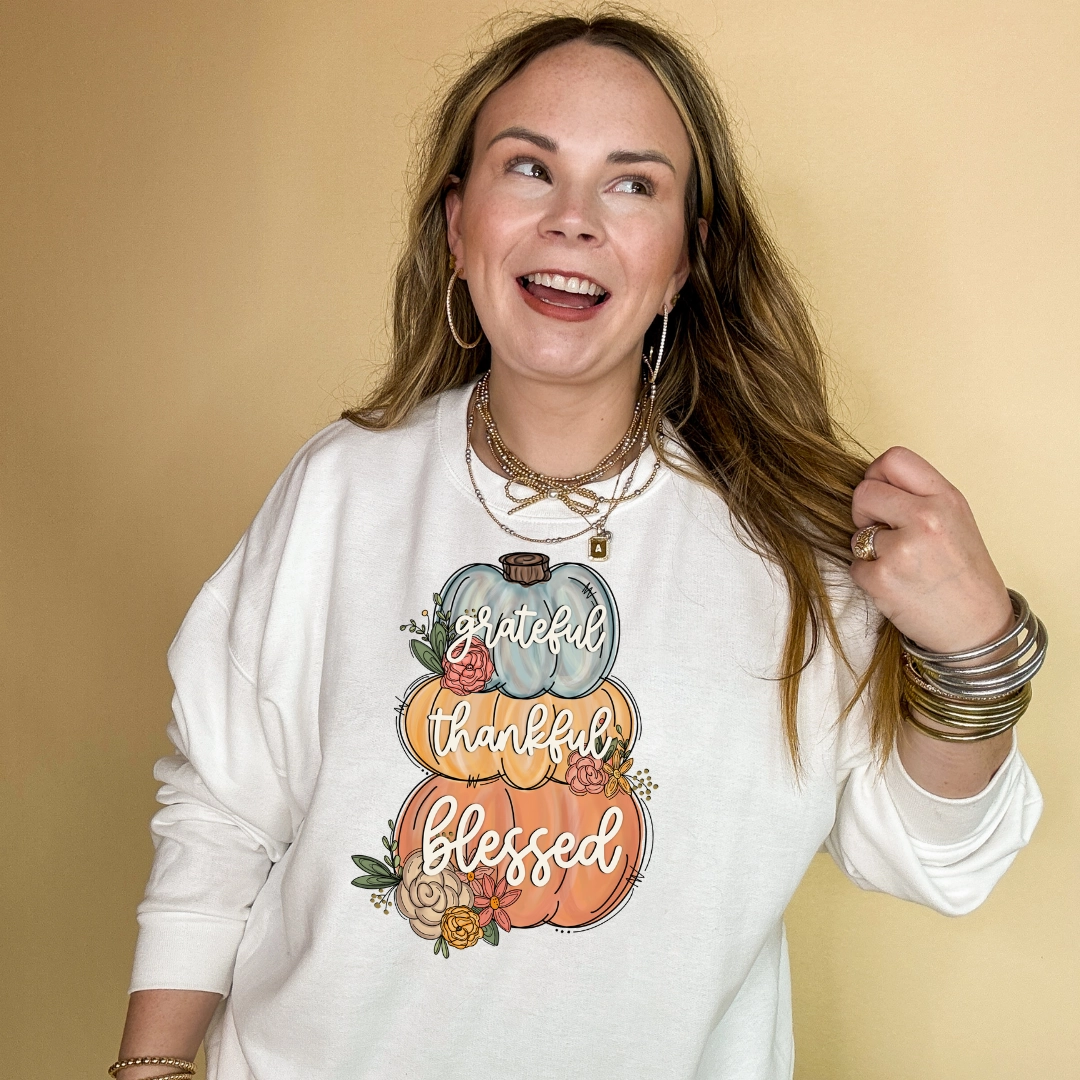 Chic Design Online Exclusive | Grateful, Thankful, Blessed Stacked Pumpkins and Floral Arrangement Graphic Sweatshirt in Multiple Color Options