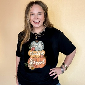 Comfy Pieces Online Exclusive | Grateful, Thankful, Blessed Stacked Pumpkins and Floral Arrangement Graphic Tee in Multiple Color Options
