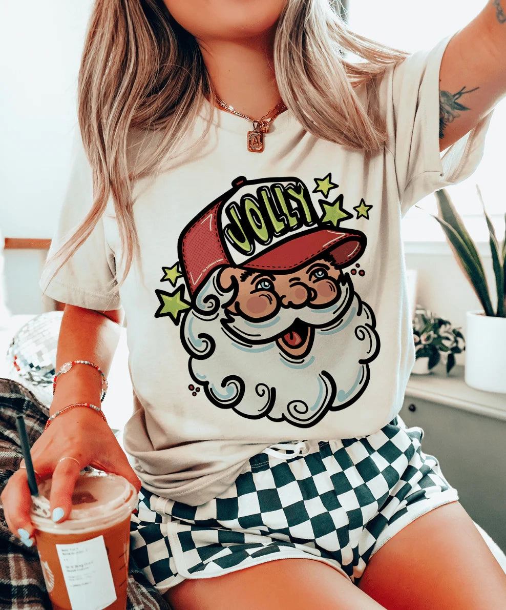 Online Exclusive | Jolly Santa Trucker Hat Graphic on Tee & Sweatshirt Options Relaxing Day