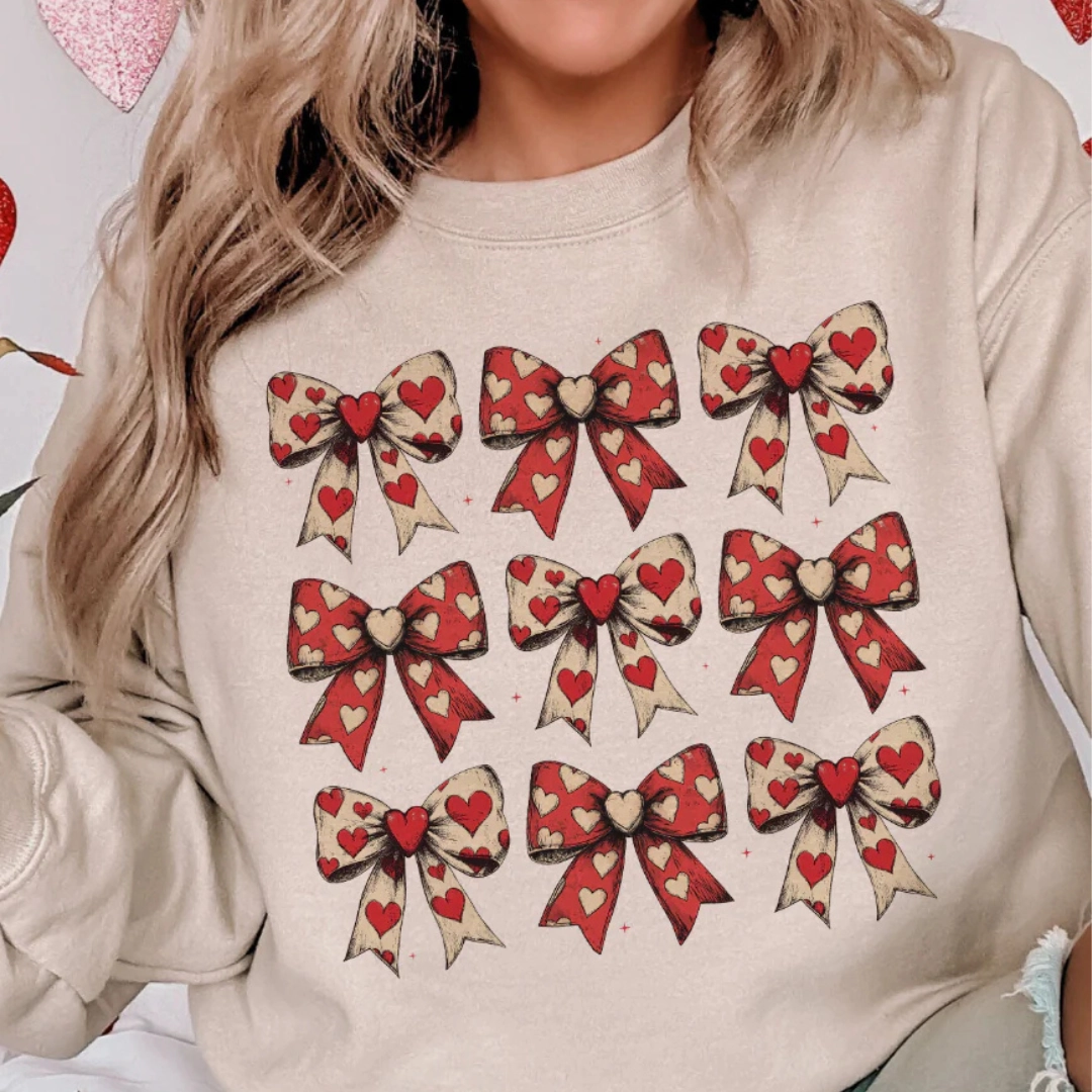 Sun Protection Anti Shrinkage Treatment Online Exclusive | On Cloud 9 Assortment of Bows with Hearts Graphic Sweatshirt in Cream