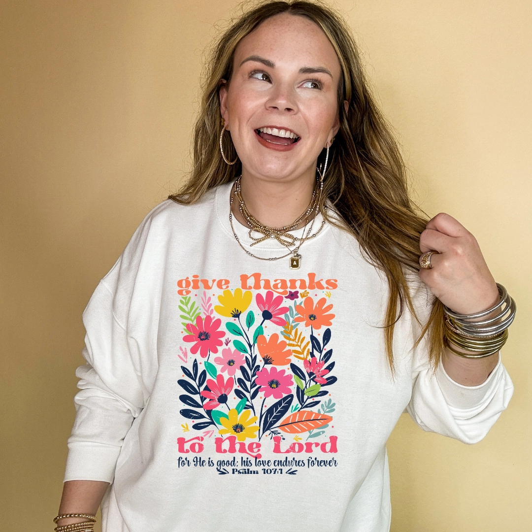 Chic Comfort Style No Slip Shoulder Design Online Exclusive | Psalm 107:1 Wildflower Wonder Graphic Sweatshirt in Multiple Color Options