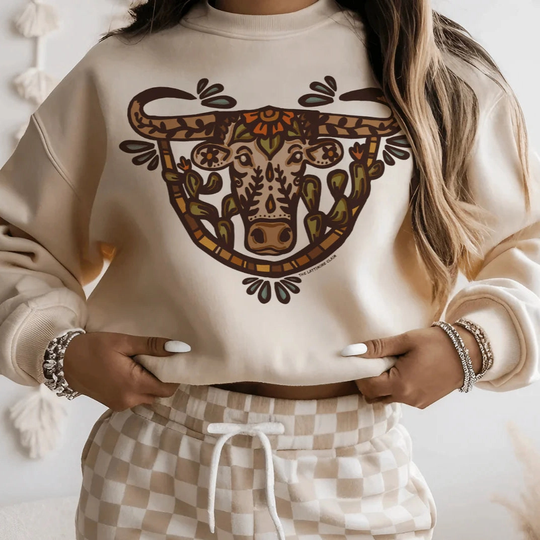Flexible Shoulder Seams Online Exclusive | The Wild Watusi Long Sleeve Graphic Sweatshirt in Cream