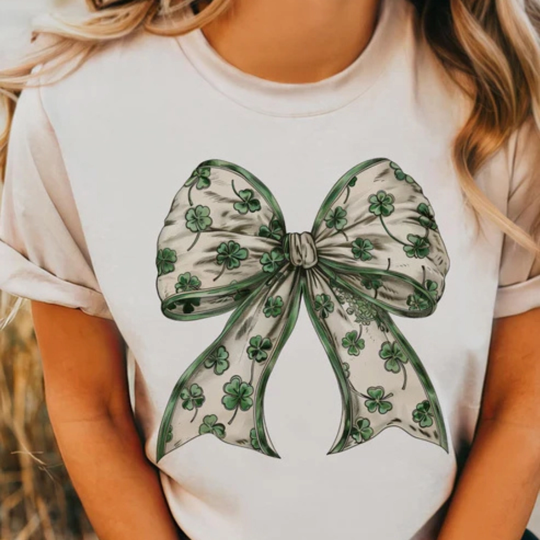 Online Exclusive | Wrapped in Luck Coquette St. Patricks Bow Graphic Tee in Cream Soft Layers