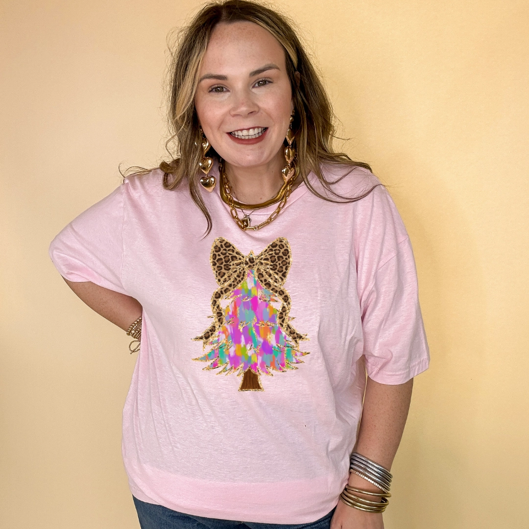 Online Exclusive | Watercolor Christmas Tree with Cheetah Print Bow Graphic Tee in Multiple Color Options loose fitting Holiday Style Trend