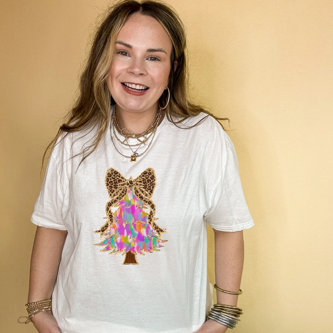 Long sleeved warmth Minimalist purity Online Exclusive | Watercolor Christmas Tree with Cheetah Print Bow Graphic Tee in Multiple Color Options