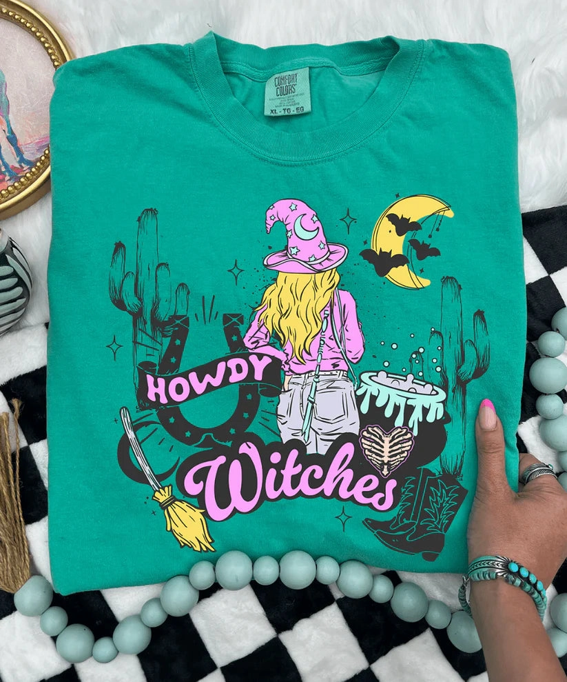 Cozy and Fashionable Breathable wear Online Exclusive | Howdy Witches Halloween Graphic on Short Sleeve Comfort Color Tee in Island Green