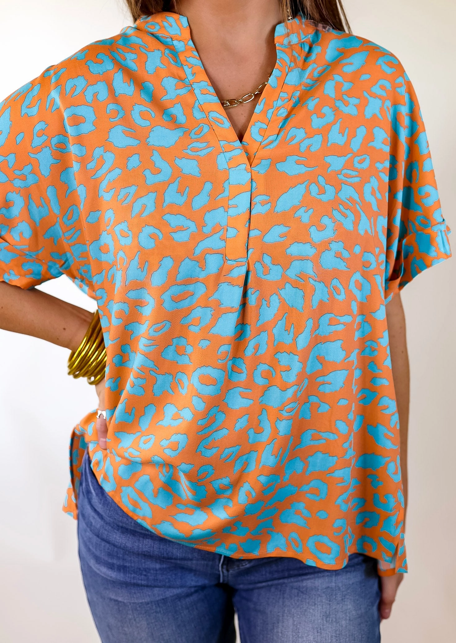 Warm Gloves Casual Wear Bold and Beautiful V Neck Teal Leopard Print Top in Orange