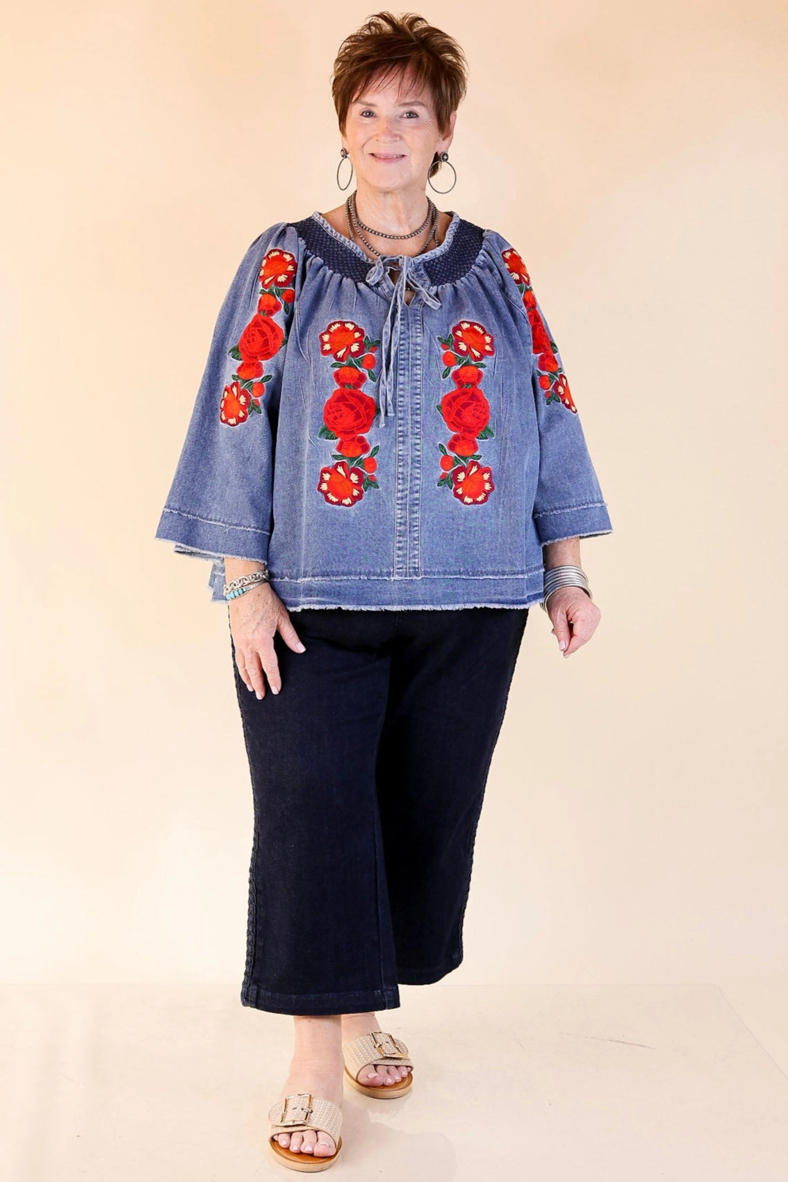 Rodeo Quincy | Tia Carmen Flowy Denim Blouse with Red Rose Embroidery Outerwear Companion Abstract art
