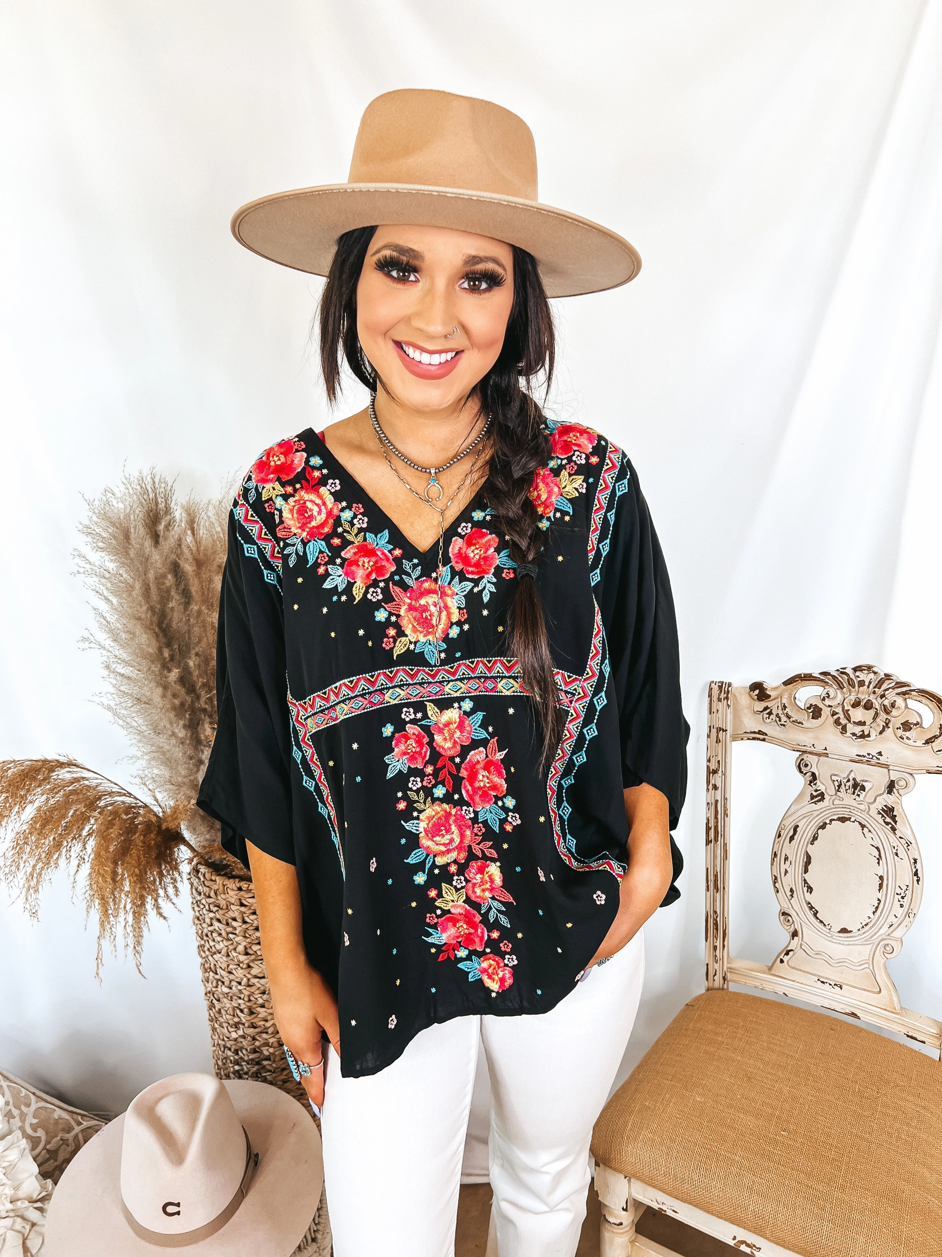 Modern Silhouette Chic Sweater More To The Story Floral Embroidered Poncho Top in Black