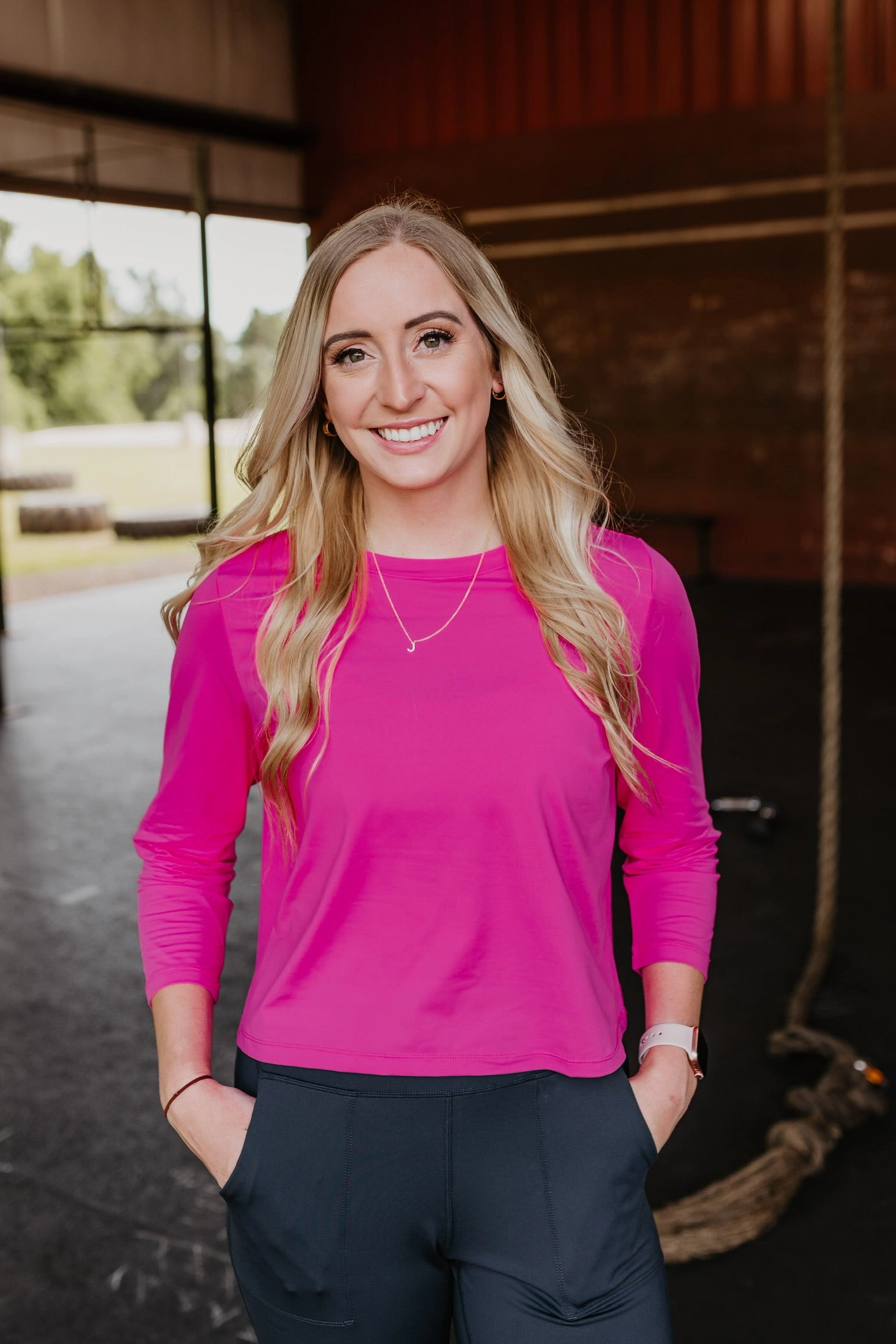 AntiStaticLining FrictionReducing Lining Get Moving Long Sleeve Cropped Top in Fuchsia