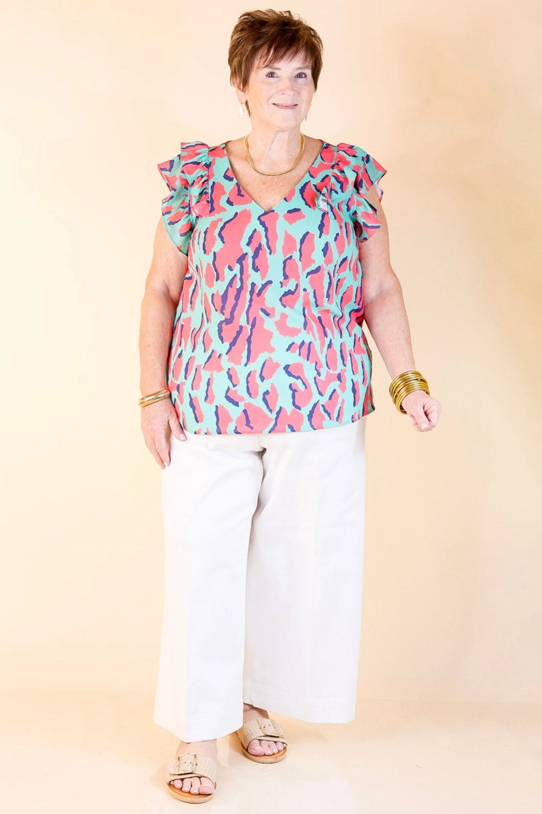 Modern Boots Wild Whirl Multi Colored Leopard Print Blouse with Ruffle Cap Sleeves in Mint