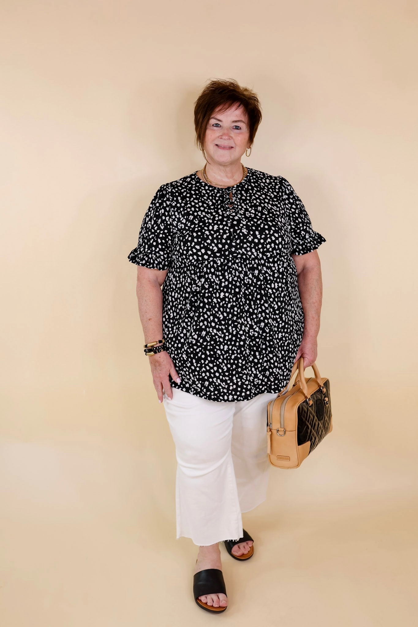 Picnic Fun Seamless Sleeve Construction Waiting For A Sign Cheetah Print Babydoll Top with Keyhole and Tie Neckline in Black